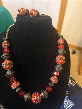 Red and brushed bronze colored beaded necklace and earrings set
